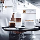 Det Norske Kaffehus latte servering