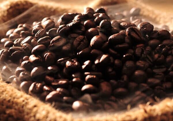 Coffee,Beans,With,Smoke,In,A,Bag.