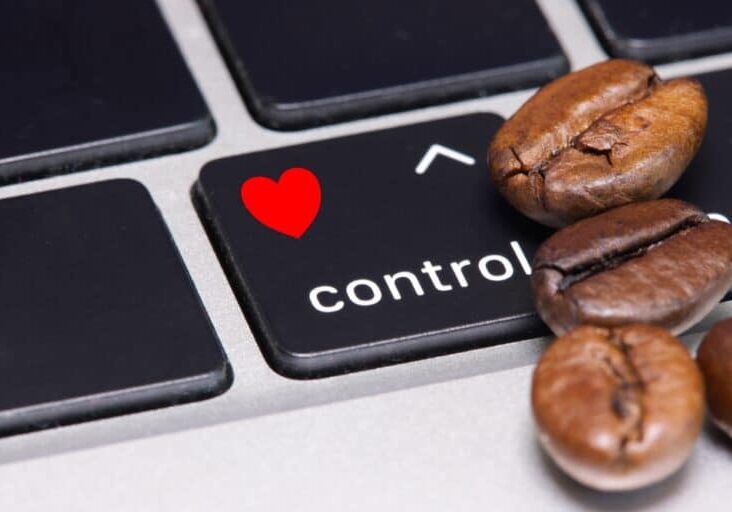 Coffee,Beans,Close,To,Control,Key,With,Red,Heart,Icon,